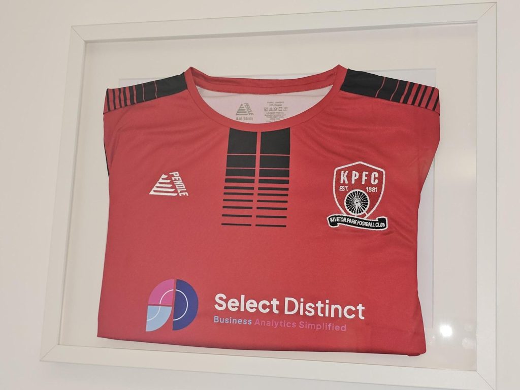 a Framed Kiveton park Football Club shirt with Select Distinct as the team sponsor