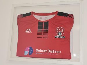 Framed Kiveton park football club shirt with the select distinct sponsor logo