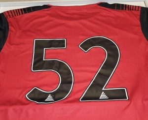 The back of the Kiveton Park Shirt showing the number 52