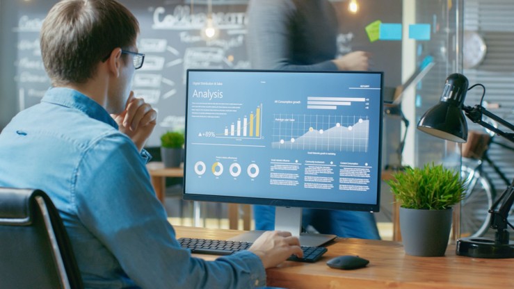 Colleague looking at key metrics on a dashboard